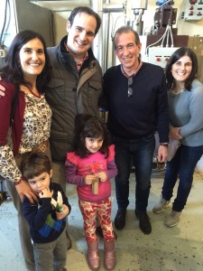 John Jr., Luisa, Gianni, Elena and Antonella Cristofano stand with a tour guide in the Oliviero Chocolate Egg Factory in Puglia, Italy