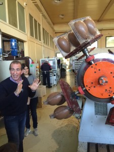 Oliviero's tour guide explains the Chocolate Egg production process to the DeCicco family