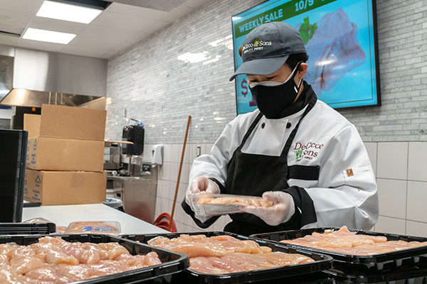 meat department packing deciccos natural chicken