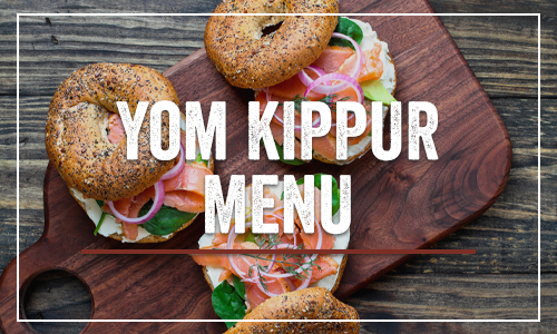 Photo button with bagles and locks that says "Yom Kippur Menu"